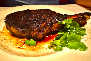 The Capital Grille signature dishes Dry Aged Ny Strip Steak Frites with Aji Verde
Lobster and Crab Cakes
Porcini-rubbed Bone-in Ribeye with 15-year Aged Balsamic
